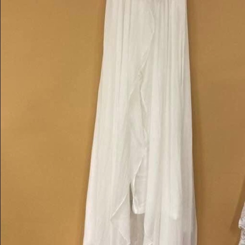 white sleeveless wedding dress